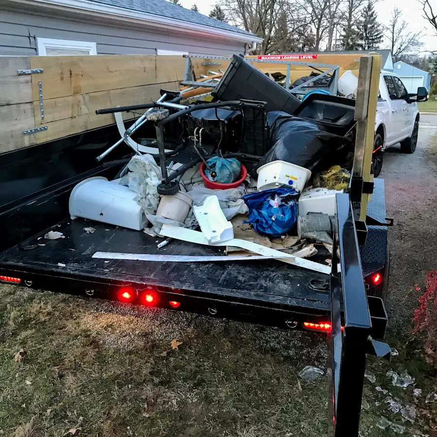 Roll-off dumpster delivered to a residential driveway in Uvalde